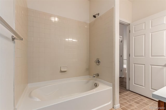 bathroom with bathing tub / shower combination and tile patterned floors