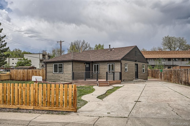 6000 Yarrow St, Arvada, CO 80004 - single story home with a shingled roof and fence private yard