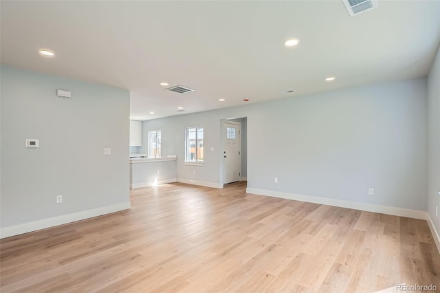 6000 Yarrow St, Arvada, CO 80004 - unfurnished room featuring recessed lighting, baseboards, light wood-type flooring, and visible vents