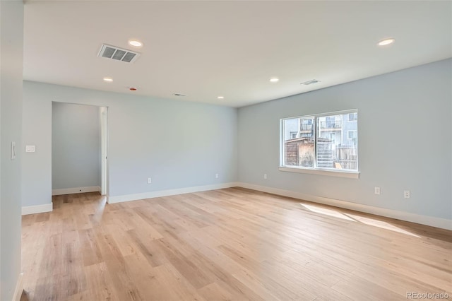 6000 Yarrow St, Arvada, CO 80004 - spare room with baseboards, recessed lighting, light wood-style flooring, and visible vents