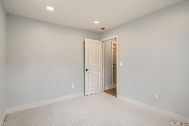 6000 Yarrow St, Arvada, CO 80004 - carpeted empty room featuring baseboards and recessed lighting