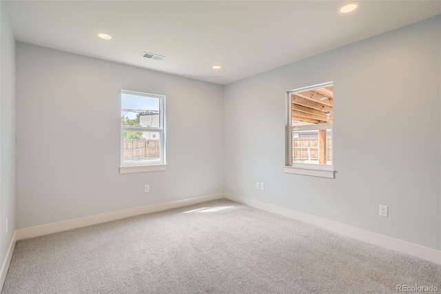 6000 Yarrow St, Arvada, CO 80004 - carpeted empty room featuring baseboards, recessed lighting, and visible vents