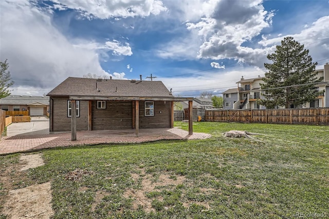 6000 Yarrow St, Arvada, CO 80004 - back of house featuring a patio area, fence, and a yard