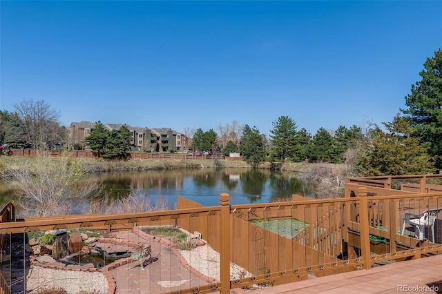 163 Ward Ct, Lakewood, CO 80228 - wooden terrace featuring a water view
