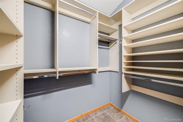 163 Ward Ct, Lakewood, CO 80228 - walk in closet with tile patterned floors