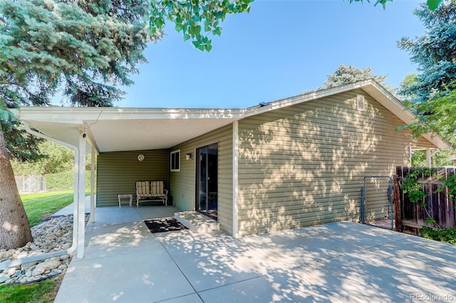 exterior space with a carport