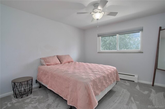 bedroom with carpet, a baseboard radiator, and ceiling fan