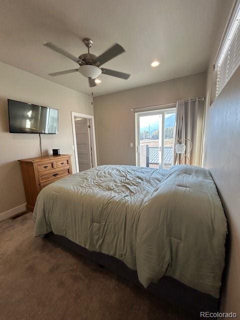 bedroom featuring ceiling fan, dark carpet, and access to outside