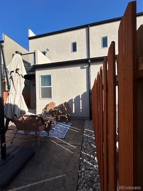 rear view of house featuring a patio area