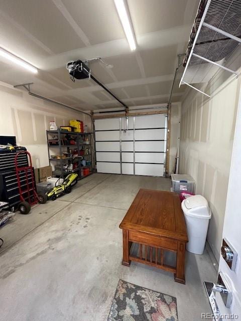 garage featuring a garage door opener