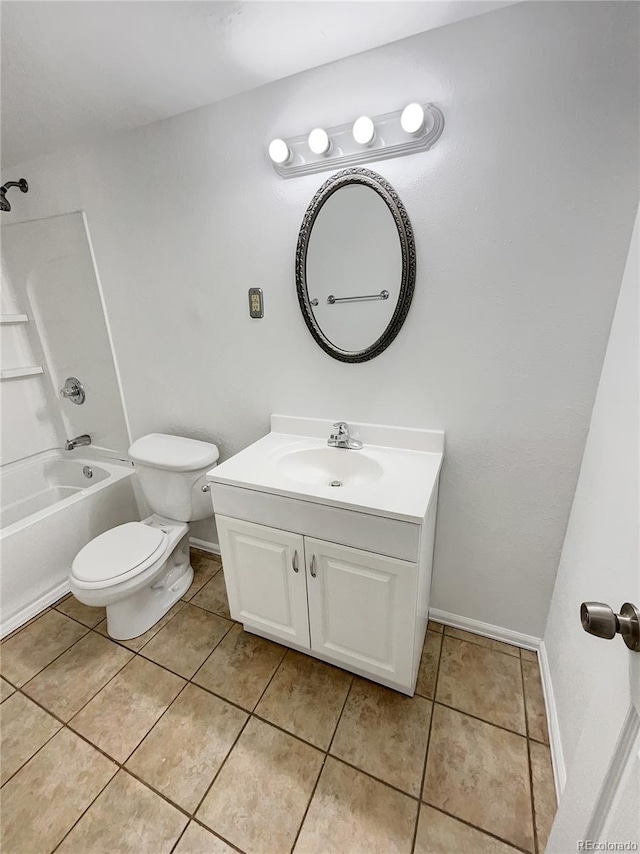 bathroom featuring toilet, bathtub / shower combination, vanity, and tile patterned flooring