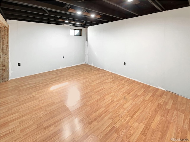 basement with wood finished floors