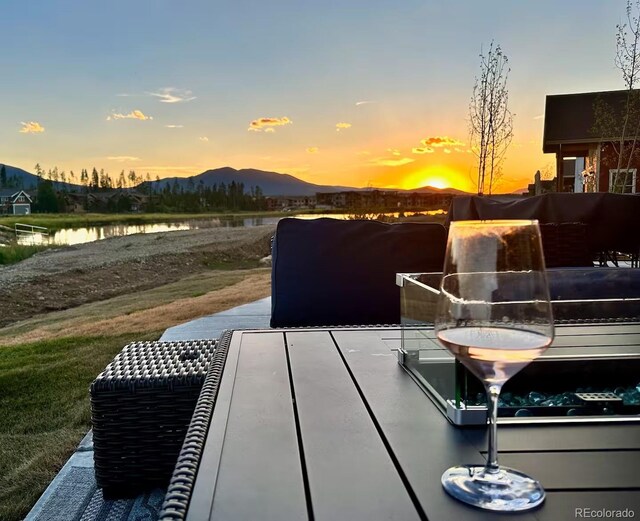 277 Hay Meadow Dr, Fraser, CO 80442 - view of patio / terrace featuring a water and mountain view