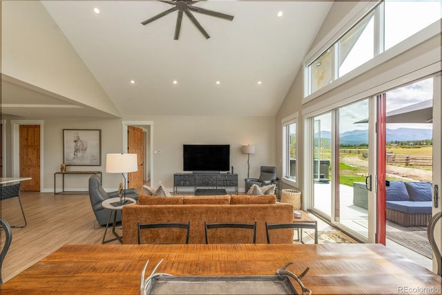 277 Hay Meadow Dr, Fraser, CO 80442 - living room featuring high vaulted ceiling, a ceiling fan, light wood finished floors, and recessed lighting