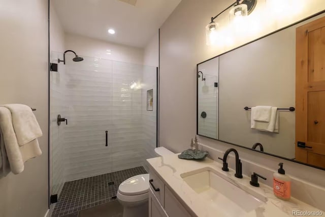 277 Hay Meadow Dr, Fraser, CO 80442 - full bath with a stall shower, vanity, toilet, and tile patterned flooring