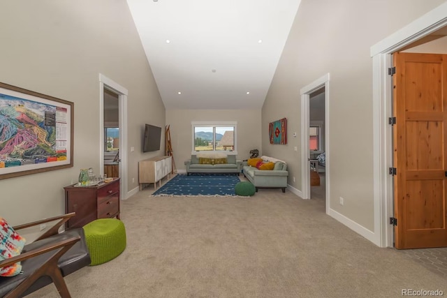 277 Hay Meadow Dr, Fraser, CO 80442 - living area with light colored carpet, lofted ceiling, and baseboards