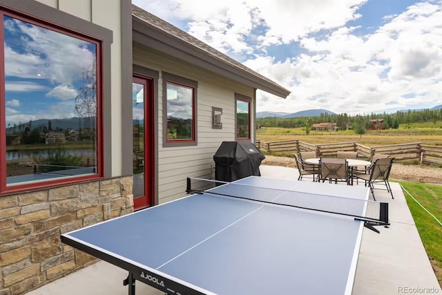 277 Hay Meadow Dr, Fraser, CO 80442 - view of patio with outdoor dining space, area for grilling, and a water and mountain view