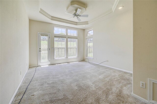 2061 Cheyenne Summer Vw, Colorado Springs, CO 80904 - carpeted spare room with a ceiling fan, a tray ceiling, and baseboards