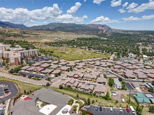 2061 Cheyenne Summer Vw, Colorado Springs, CO 80904 - aerial view of property's location featuring a mountain backdrop and nearby suburban area