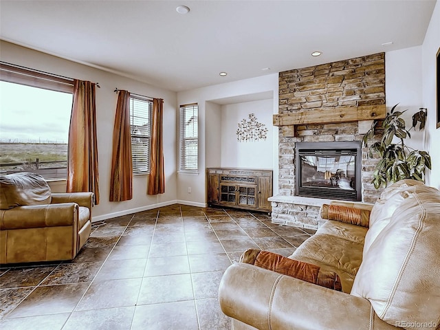 living room featuring a fireplace and tile patterned floors