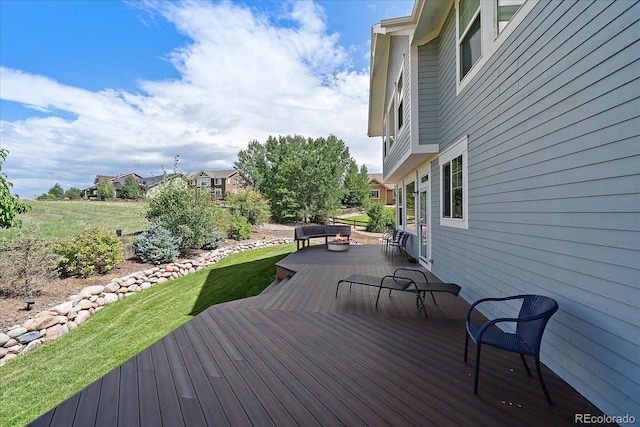 deck featuring a yard