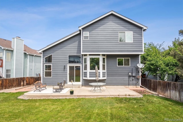 back of house with a patio area