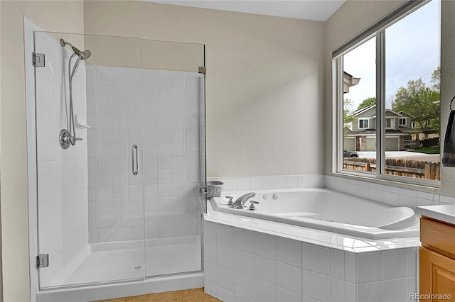 10653 W Parkhill Dr, Littleton, CO 80127 - full bath featuring a stall shower, a bath, and vanity