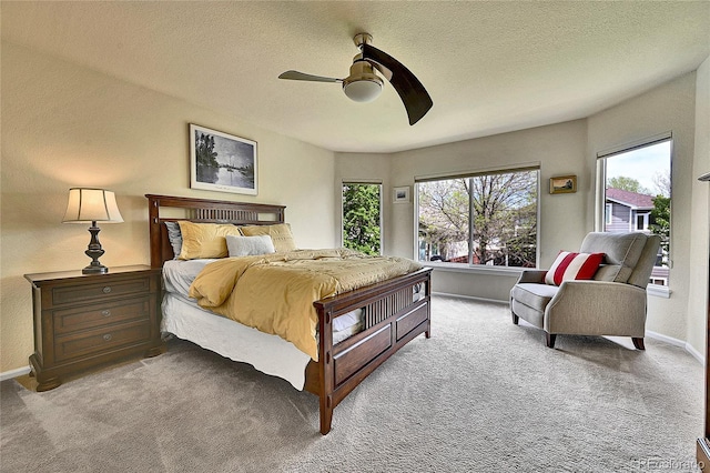 10653 W Parkhill Dr, Littleton, CO 80127 - bedroom featuring carpet, a textured ceiling, a ceiling fan, and baseboards