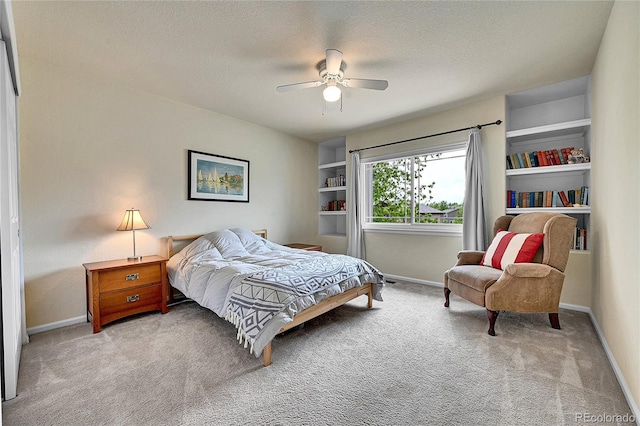 10653 W Parkhill Dr, Littleton, CO 80127 - bedroom featuring carpet, baseboards, a textured ceiling, and ceiling fan