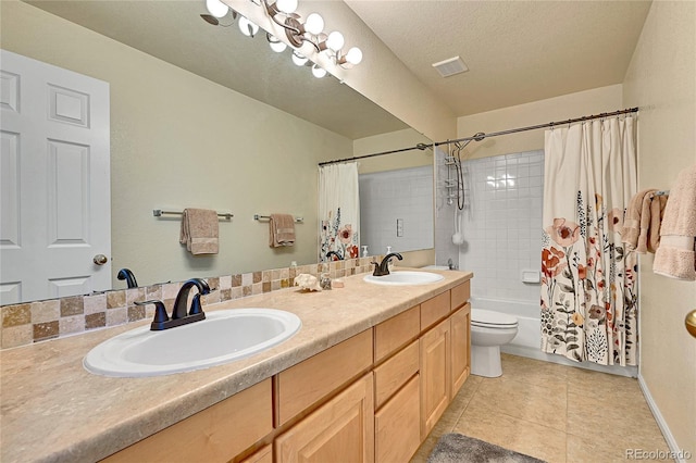10653 W Parkhill Dr, Littleton, CO 80127 - bathroom featuring double vanity, shower / bath combination with curtain, tile patterned flooring, and toilet
