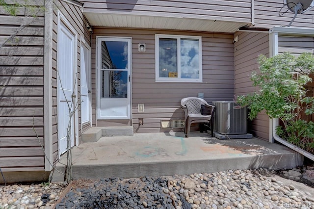 doorway to property with cooling unit