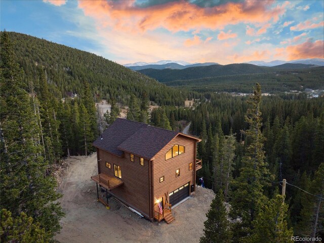 aerial view at dusk with a mountain view