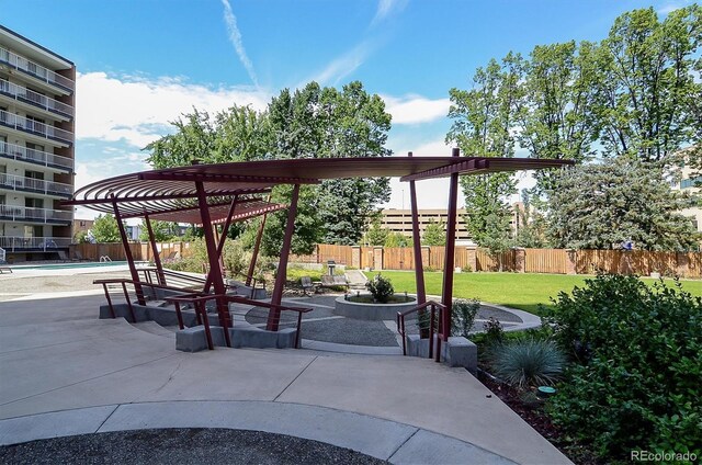 4801 E 9th Ave Unit 402S, Denver, CO 80220 - view of property's community with a pergola, a pool, and a patio area