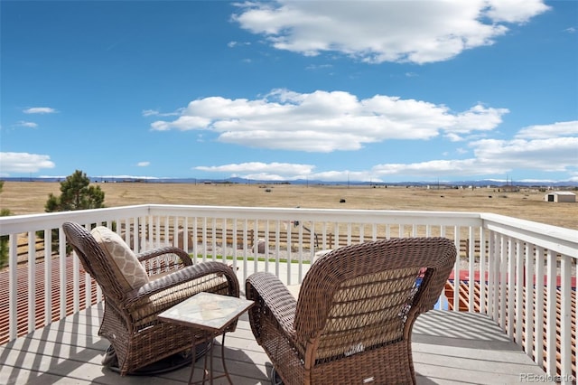 deck featuring a rural view