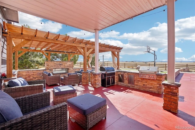 view of patio with area for grilling, a pergola, and an outdoor living space