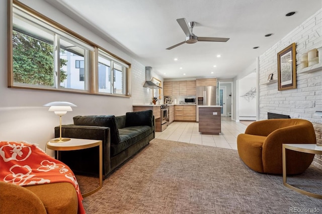 living area featuring a fireplace, a ceiling fan, a baseboard heating unit, light tile patterned flooring, and recessed lighting