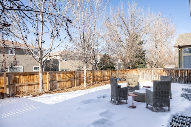 view of yard covered in snow