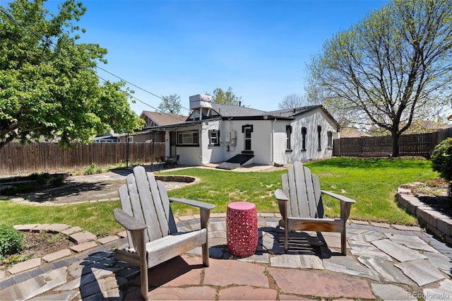 3147 W 39th Ave, Denver, CO 80211 - back of property featuring a patio area and stucco siding