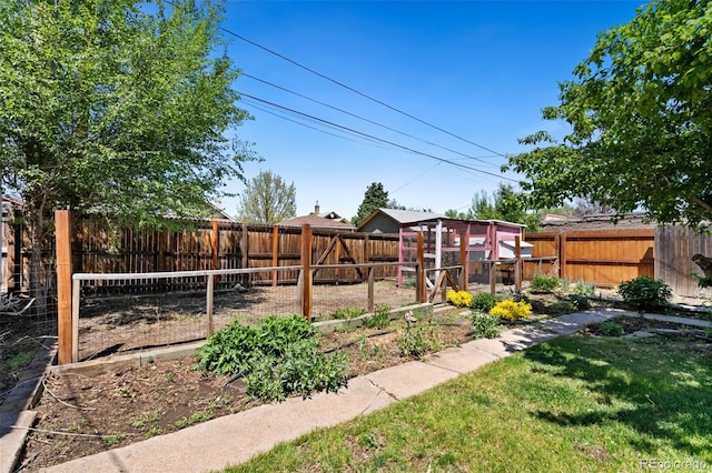 3147 W 39th Ave, Denver, CO 80211 - view of yard with exterior structure, a garden, and an outdoor structure