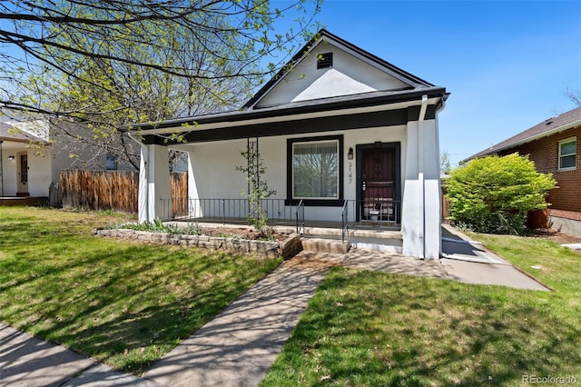 3147 W 39th Ave, Denver, CO 80211 - view of front of property with stucco siding and a porch