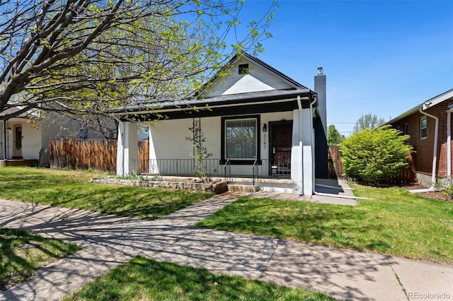 3147 W 39th Ave, Denver, CO 80211 - view of front facade with a porch and stucco siding