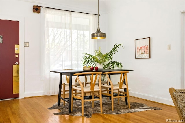 3147 W 39th Ave, Denver, CO 80211 - dining area featuring wood finished floors and baseboards