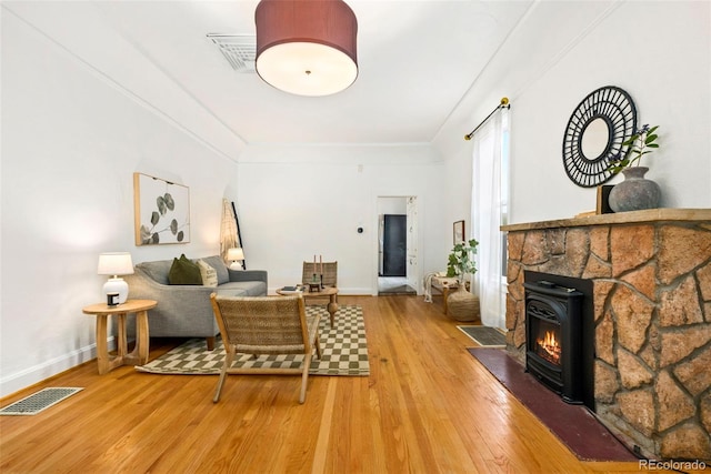 3147 W 39th Ave, Denver, CO 80211 - living room with light wood-type flooring, baseboards, and crown molding