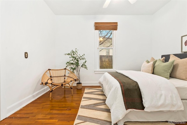 3147 W 39th Ave, Denver, CO 80211 - bedroom featuring wood finished floors, baseboards, and a ceiling fan