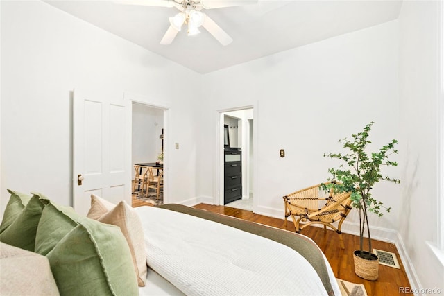 3147 W 39th Ave, Denver, CO 80211 - bedroom with wood finished floors, baseboards, and a ceiling fan