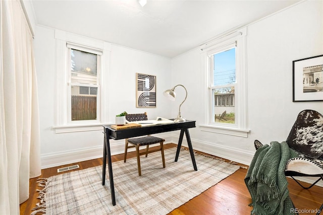 3147 W 39th Ave, Denver, CO 80211 - home office with baseboards and wood finished floors