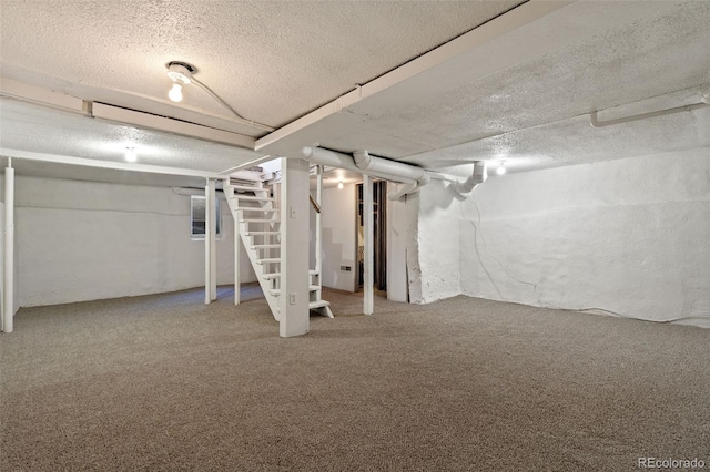 3147 W 39th Ave, Denver, CO 80211 - finished basement featuring a textured ceiling, carpet flooring, and stairs