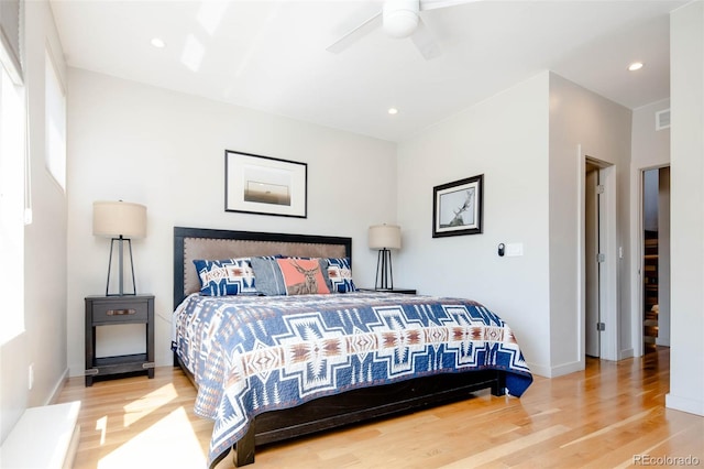 bedroom featuring ceiling fan and hardwood / wood-style flooring