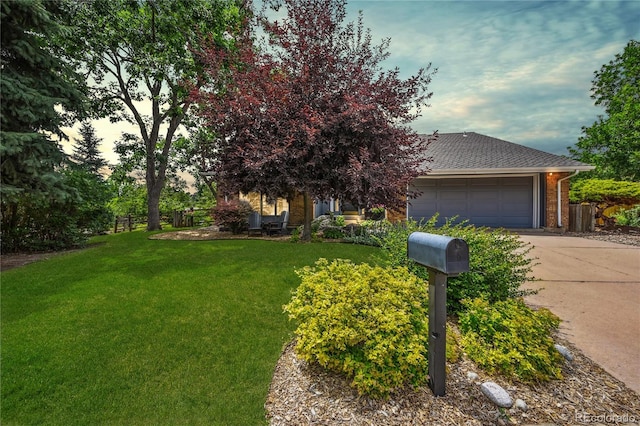 8413 E Jamison Cir, Englewood, CO 80112 - view of property hidden behind natural elements featuring concrete driveway, a garage, a shingled roof, and brick siding