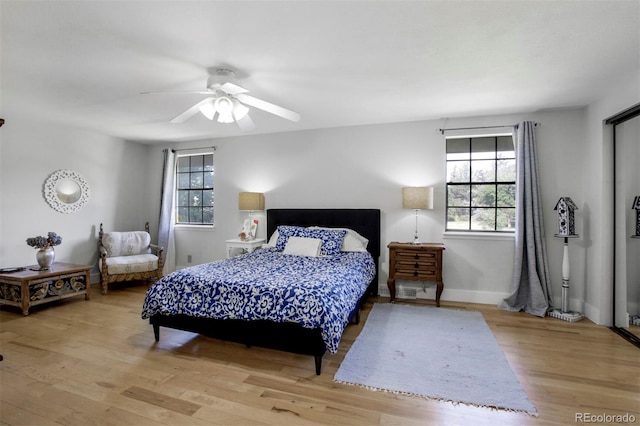 8413 E Jamison Cir, Englewood, CO 80112 - bedroom with wood finished floors and ceiling fan